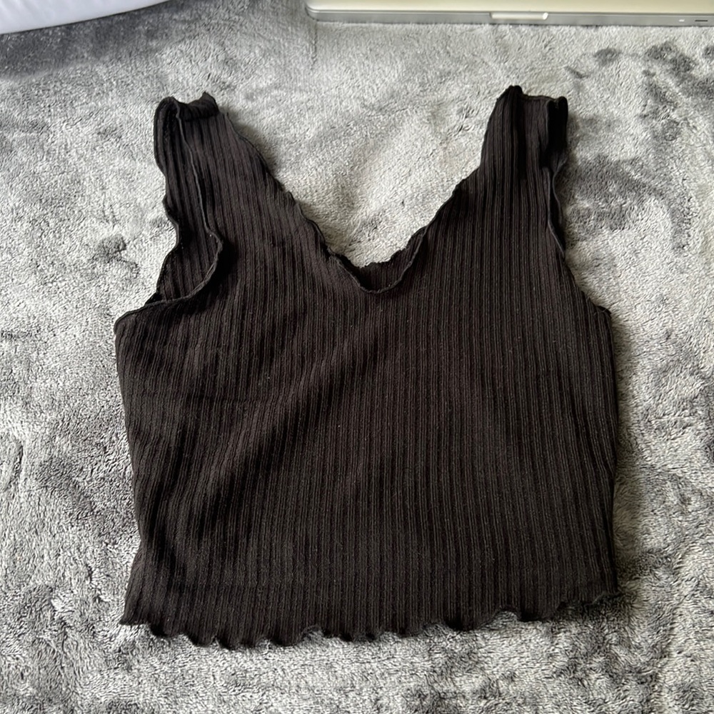 black top with a ruffle design